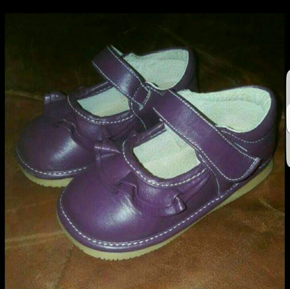 Size 9 (runs small IMO) purple squeaker shoe